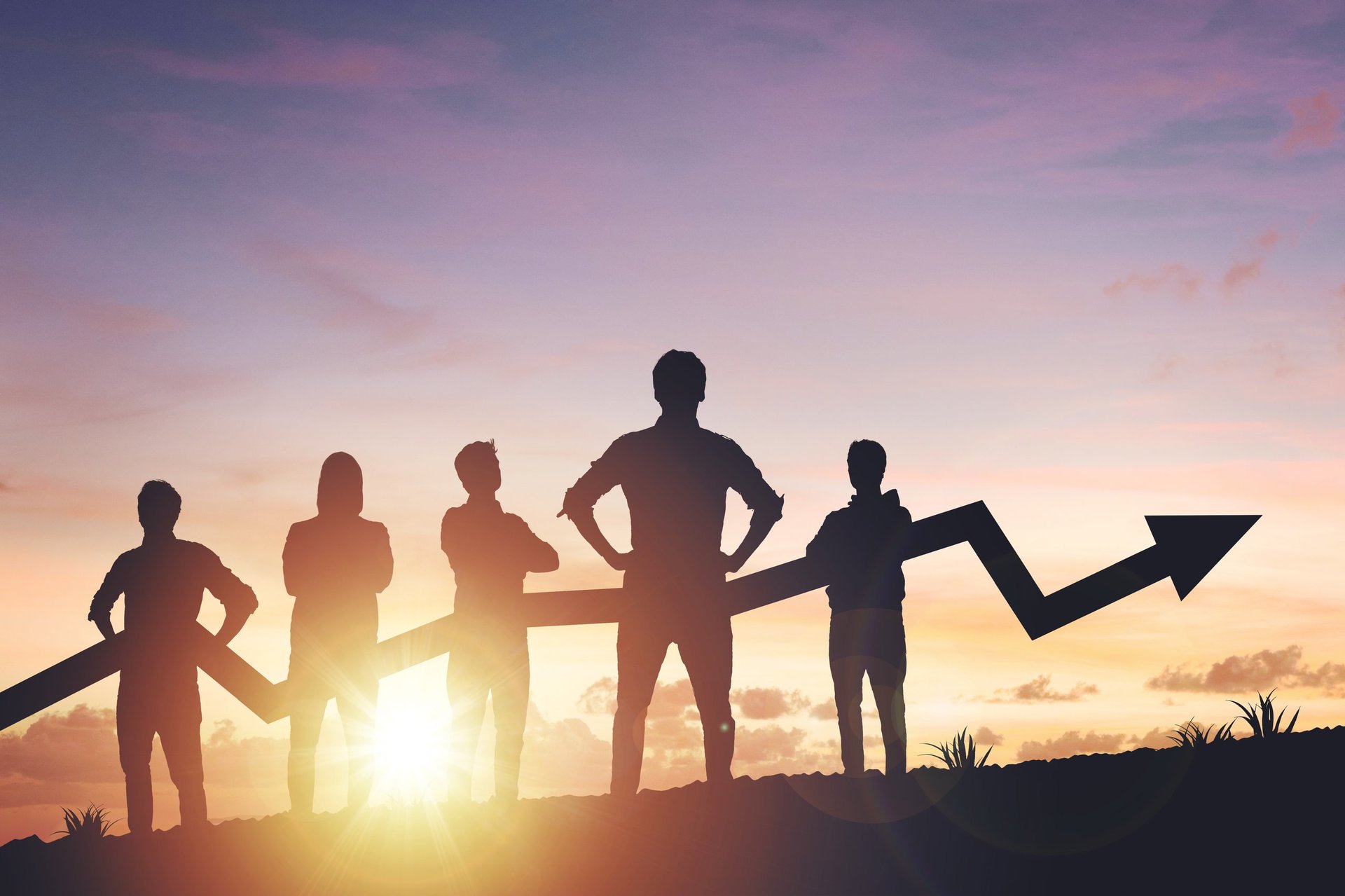 Team silhouette and up graph arrow on sunset background